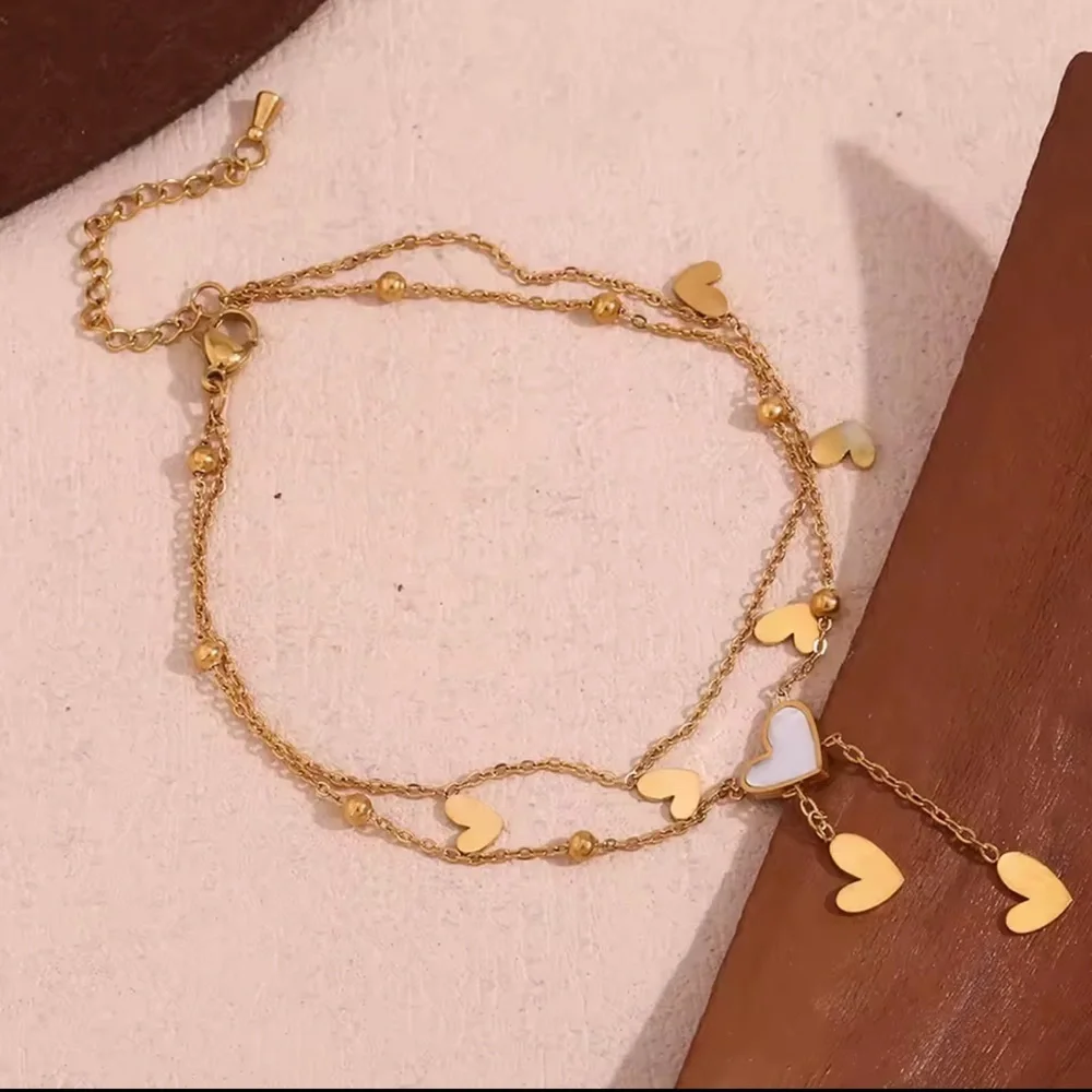 Heart-shaped White Beige Tassel Anklet Gold 18K

Stainless Steel Anklet - Picture 6 of 9